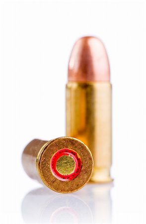 couple of bullets isolated on white background Foto de stock - Royalty-Free Super Valor e Assinatura, Número: 400-05097257