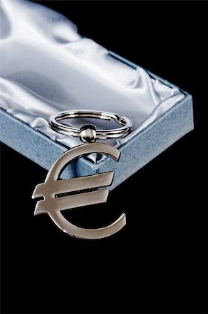 simsearch:695-05780265,k - euro currency symbol with box isolated on black Photographie de stock - Aubaine LD & Abonnement, Code: 400-05098040