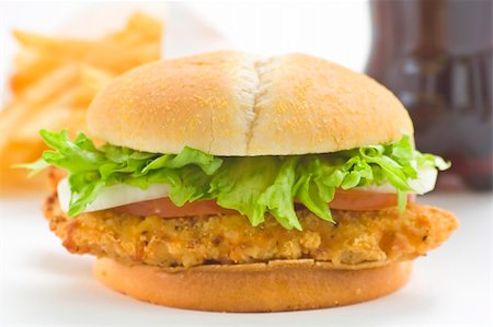 simsearch:400-08372466,k - crisp chicken burger with tomato onion cheese lettuce isolated Foto de stock - Super Valor sin royalties y Suscripción, Código: 400-05098128