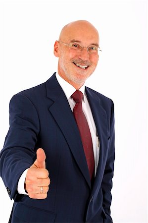 dpix (artist) - optimistic senior businessman showing a thumb up and smiling (isolated on white) Photographie de stock - Aubaine LD & Abonnement, Code: 400-05098435