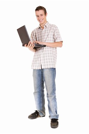 simsearch:400-04704759,k - casual teenager with laptop. over white background Stock Photo - Budget Royalty-Free & Subscription, Code: 400-05098601