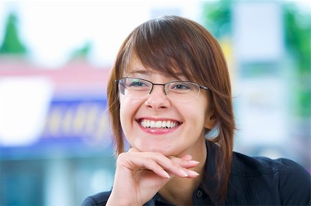 Portrait of young beautiful smiling  girl in office environment Stock Photo - Budget Royalty-Free & Subscription, Code: 400-05098998