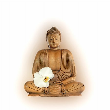 simsearch:400-04463989,k - Buddha with aura and eyes closed in prayer with an orchid flower, over white background. Stock Photo - Budget Royalty-Free & Subscription, Code: 400-05099216