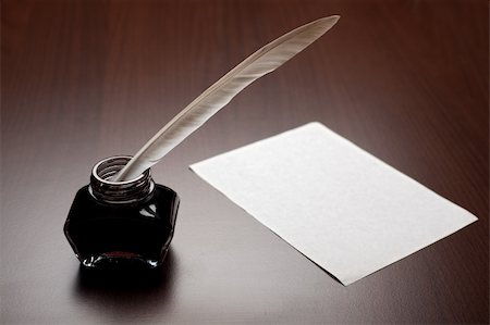 simsearch:400-06853377,k - Ink, quill and an empty page on brown desk Stock Photo - Budget Royalty-Free & Subscription, Code: 400-05099511