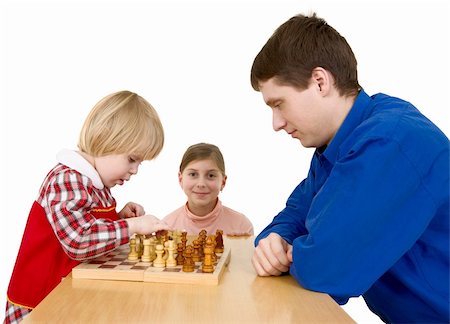 Man and childs play chess on a white background Stock Photo - Budget Royalty-Free & Subscription, Code: 400-05090023