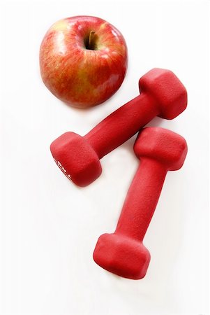 simsearch:400-07754604,k - two red dumbbells and red apple isolated on white Stock Photo - Budget Royalty-Free & Subscription, Code: 400-05090152