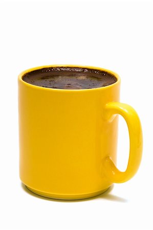 simsearch:400-03971684,k - Yellow mug from coffee on a white background Fotografie stock - Microstock e Abbonamento, Codice: 400-05090343
