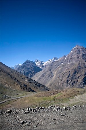 The Andes form the world's longest exposed mountain range. They lie as a continuous chain of highland along the western coast of South America. Stock Photo - Budget Royalty-Free & Subscription, Code: 400-05091347