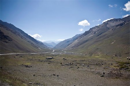 The Andes form the world's longest exposed mountain range. They lie as a continuous chain of highland along the western coast of South America. Stock Photo - Budget Royalty-Free & Subscription, Code: 400-05091348