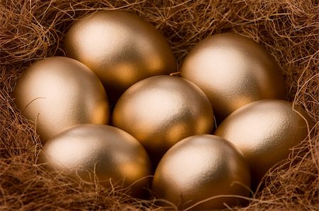 egg with jewels - Seven golden eggs in nest describing wealthy or treasure. Stock Photo - Budget Royalty-Free & Subscription, Code: 400-05092407