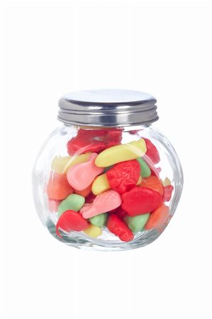 simsearch:400-04781520,k - Colorful candies in the glass jar isolated on white background Photographie de stock - Aubaine LD & Abonnement, Code: 400-05092434