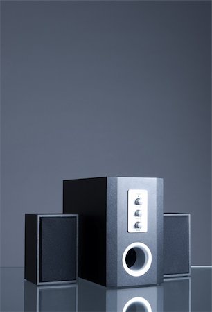 Audio speakers on the gray background with reflection Stock Photo - Budget Royalty-Free & Subscription, Code: 400-05092469