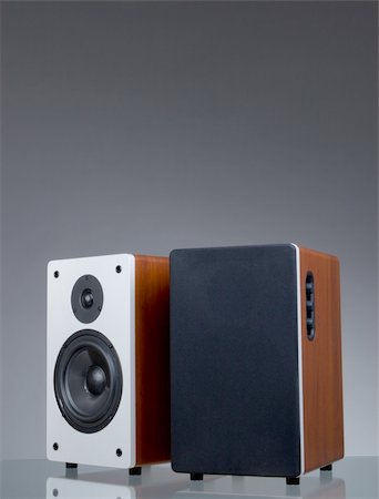 simsearch:400-05131379,k - Audio speakers on the gray background with reflection Photographie de stock - Aubaine LD & Abonnement, Code: 400-05092474