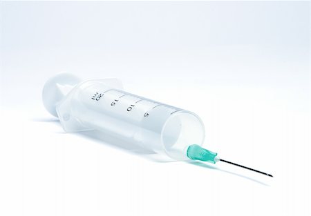 simsearch:400-04311636,k - Empty syringe isolated on the white background Foto de stock - Royalty-Free Super Valor e Assinatura, Número: 400-05092492