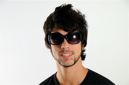 simsearch:400-04163139,k - Portrait of young trendy hispanic man wearing sunglasses isolated Photographie de stock - Aubaine LD & Abonnement, Code: 400-05092664