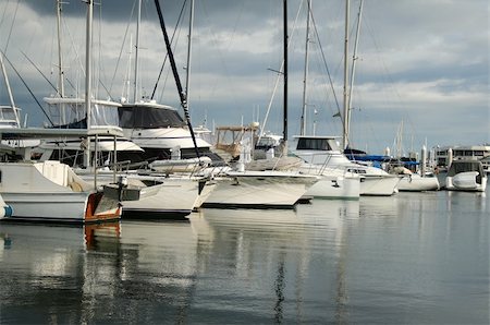 simsearch:400-05255037,k - Bows of boats lined up at Southport Marina on the Gold Coast Australia in the early morning light. Stock Photo - Budget Royalty-Free & Subscription, Code: 400-05092802