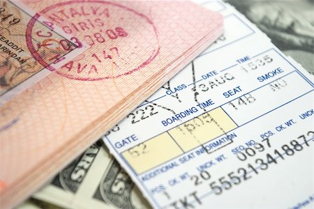 airplane ticket and passport on american dollars Stock Photo - Budget Royalty-Free & Subscription, Code: 400-05092925