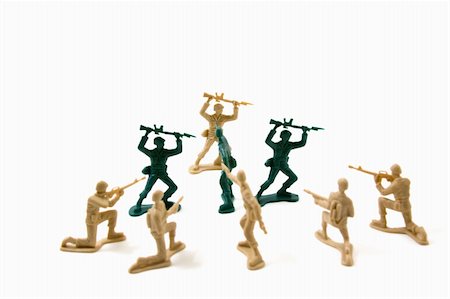 Isolated Plastic Toy Soldiers - Stubborn Concept Stock Photo - Budget Royalty-Free & Subscription, Code: 400-05092969