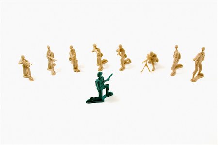 Isolated Plastic Toy Soldiers - Stubborn Concept Stock Photo - Budget Royalty-Free & Subscription, Code: 400-05092970