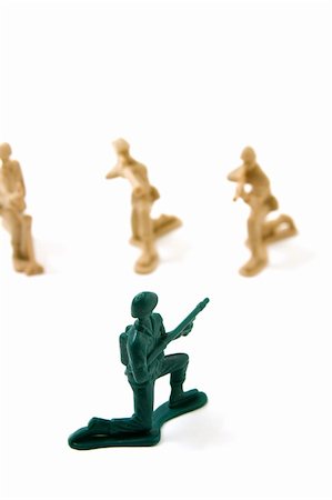 Isolated Plastic Toy Soldiers - Courage Concept Stock Photo - Budget Royalty-Free & Subscription, Code: 400-05092971