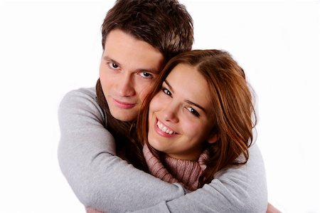 simsearch:400-04702744,k - Young attractive couple passionately in love holding isolated on white Fotografie stock - Microstock e Abbonamento, Codice: 400-05092997