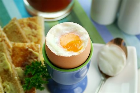 simsearch:400-05255035,k - Breakfast of a boiled egg, toast fingers and tomato juice. Stock Photo - Budget Royalty-Free & Subscription, Code: 400-05093166