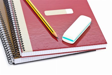 simsearch:400-03912552,k - Pencil and eraser on a two notebooks with soft shadow on white background. Shallow depth of field Stockbilder - Microstock & Abonnement, Bildnummer: 400-05093386