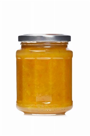 Plum jam glass jar reflected on white background Foto de stock - Super Valor sin royalties y Suscripción, Código: 400-05093387
