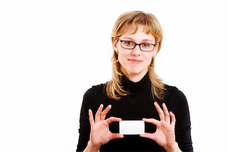 simsearch:400-04648812,k - smiling girl in glasses holds a white card Stock Photo - Budget Royalty-Free & Subscription, Code: 400-05093418