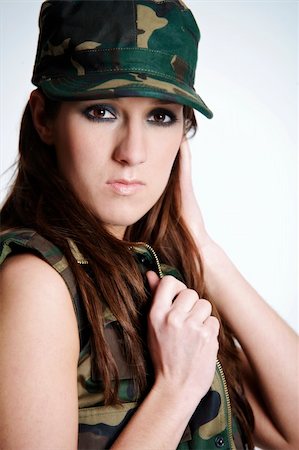 simsearch:400-05371802,k - Beautiful young woman in army clothing Stockbilder - Microstock & Abonnement, Bildnummer: 400-05093740