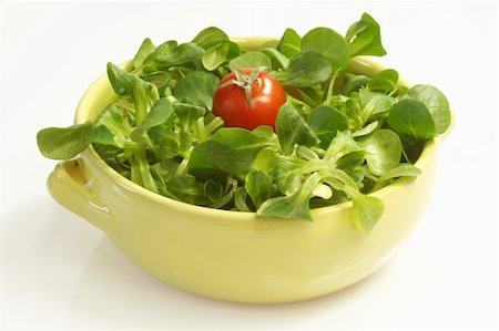 Field salad in a bowl on white background Photographie de stock - Aubaine LD & Abonnement, Code: 400-05093954