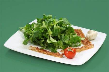 simsearch:400-04165864,k - Field salad on a plate on green background Stockbilder - Microstock & Abonnement, Bildnummer: 400-05093953