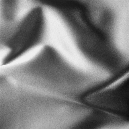 simsearch:630-02220311,k - red satin background. A satiny fabric with beautiful light-shadow waves Stock Photo - Budget Royalty-Free & Subscription, Code: 400-05104104