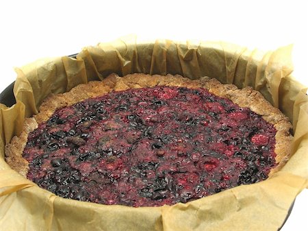 photos of blueberries for kitchen - Delicious berry cake in baking pan with baking paper Foto de stock - Super Valor sin royalties y Suscripción, Código: 400-05104523