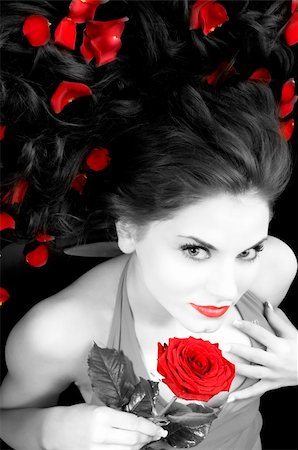 simsearch:400-05721993,k - wide angle portrait of pretty woman with red dress rose and petals Photographie de stock - Aubaine LD & Abonnement, Code: 400-05105478