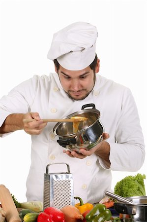 simsearch:689-03128584,k - young chef preparing lunch on white background Stockbilder - Microstock & Abonnement, Bildnummer: 400-05107554