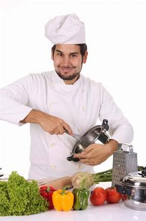 simsearch:689-03128584,k - young chef preparing lunch on white background Stockbilder - Microstock & Abonnement, Bildnummer: 400-05107552