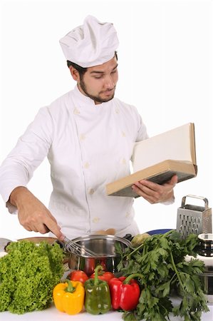 simsearch:689-03128584,k - young chef preparing lunch on white background Stockbilder - Microstock & Abonnement, Bildnummer: 400-05107564