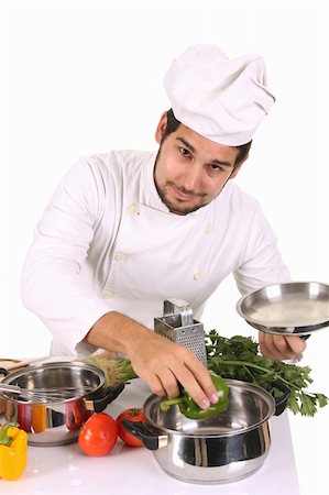 simsearch:689-03128584,k - young chef preparing lunch on white background Stockbilder - Microstock & Abonnement, Bildnummer: 400-05107562