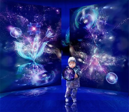 A little boy stands in a hall before pritkrytymi voratami and gets the model of universe on the hips, attentively studying her. Stockbilder - Microstock & Abonnement, Bildnummer: 400-05108086