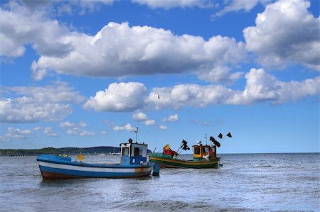 old fishing boats against beautiful sky Stock Photo - Budget Royalty-Free & Subscription, Code: 400-05108277