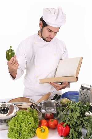 simsearch:400-04116514,k - young chef preparing lunch on white background Stockbilder - Microstock & Abonnement, Bildnummer: 400-05108399