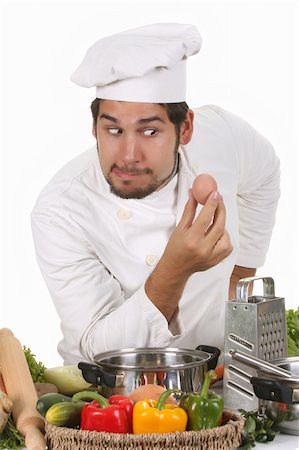 young funny chef with egg, isolated on white Stock Photo - Budget Royalty-Free & Subscription, Code: 400-05108404