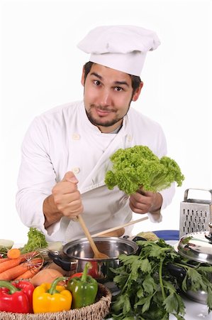 simsearch:689-03128584,k - young chef preparing lunch on white background Stockbilder - Microstock & Abonnement, Bildnummer: 400-05108400