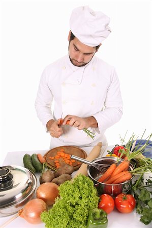 simsearch:689-03128584,k - young chef preparing lunch on white background Stockbilder - Microstock & Abonnement, Bildnummer: 400-05108402