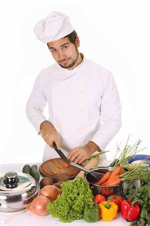 simsearch:689-03128584,k - young chef preparing lunch on white background Stockbilder - Microstock & Abonnement, Bildnummer: 400-05108414