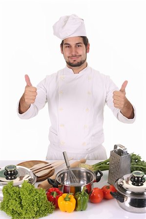 simsearch:689-03128584,k - young chef preparing lunch on white background Stockbilder - Microstock & Abonnement, Bildnummer: 400-05108412