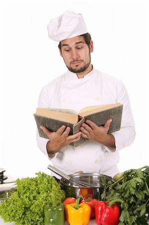 simsearch:400-04116514,k - young chef preparing lunch on white background Stockbilder - Microstock & Abonnement, Bildnummer: 400-05108424