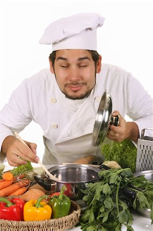 simsearch:689-03128584,k - young chef smelling the aroma delicious food Stockbilder - Microstock & Abonnement, Bildnummer: 400-05108425
