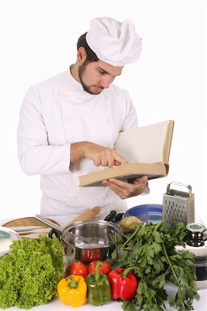 simsearch:400-04116514,k - young chef preparing lunch on white background Stockbilder - Microstock & Abonnement, Bildnummer: 400-05108421
